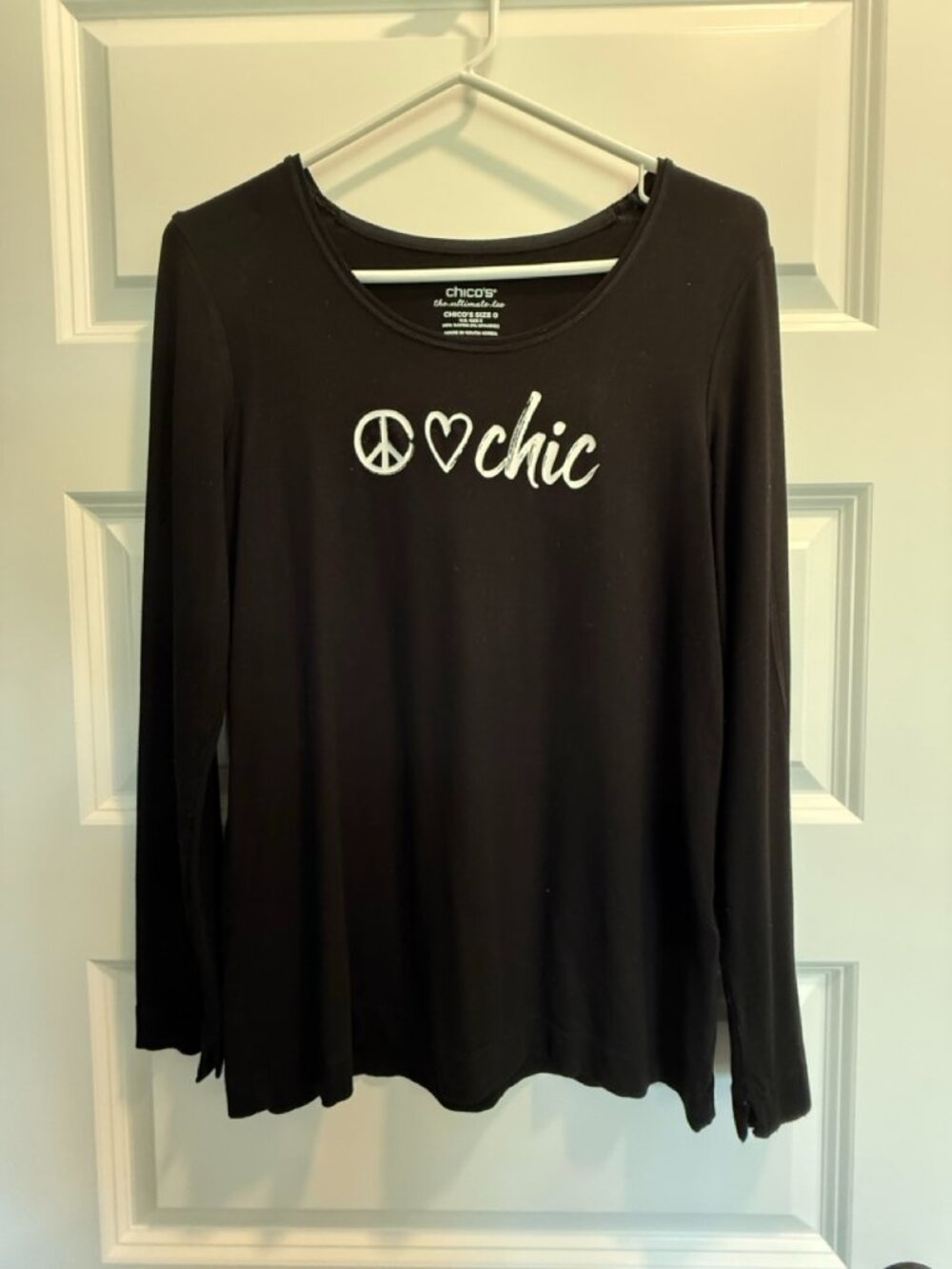 Chico's "Peace, Love, Chic" Long-Sleeve T-Shirt in black.
